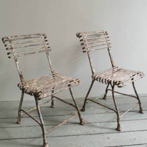 A pair of French Arras wrought iron chairs, 19th Century 